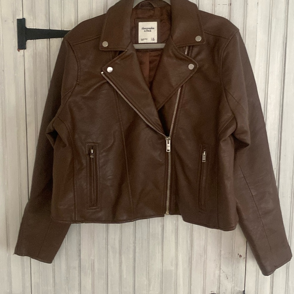 Woman’s brown faux leather bomber jacket.